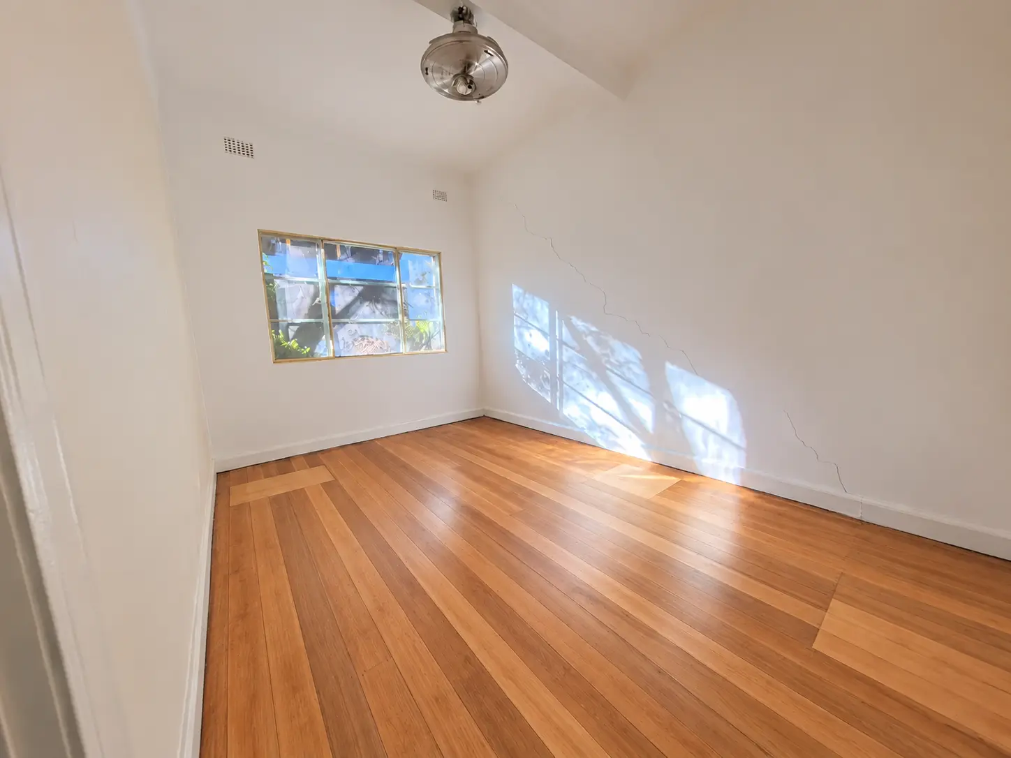 Repaired and resealed timber flooring in the Queens Road apartment